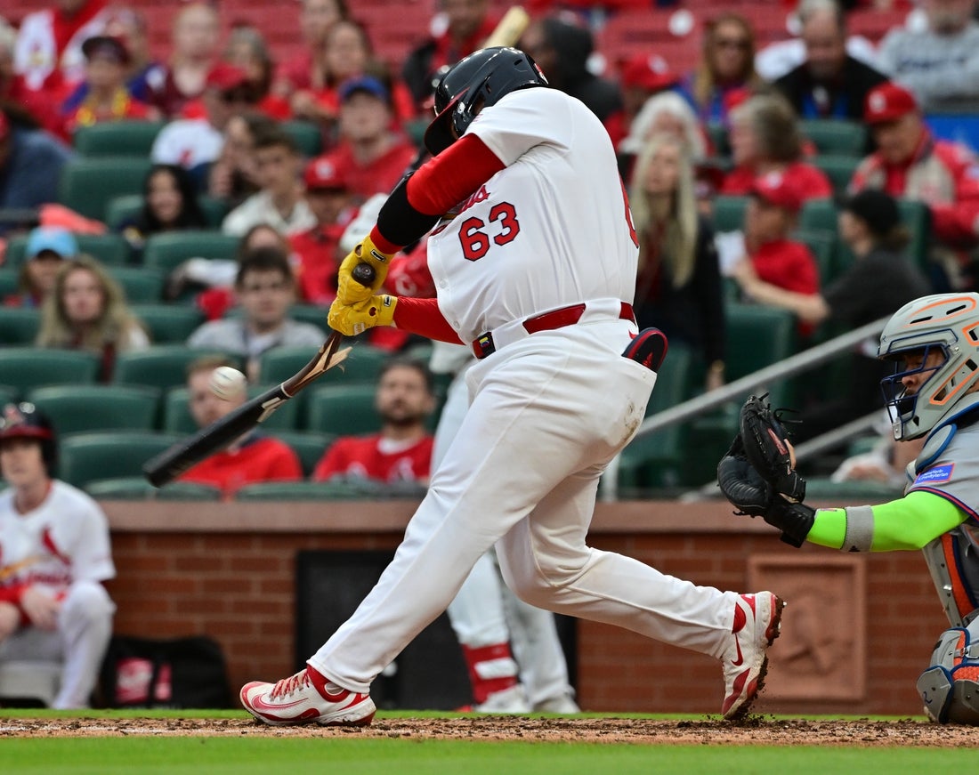 May 4, 2025; St. Louis, Missouri, USA; St. Louis Cardinals catcher Yohel Pozo (63) breaks his bat in the fourth inning against the New York Mets at Busch Stadium. Mandatory Credit: Tim Vizer-Imagn Images