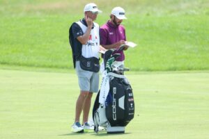 Max Homa caddie