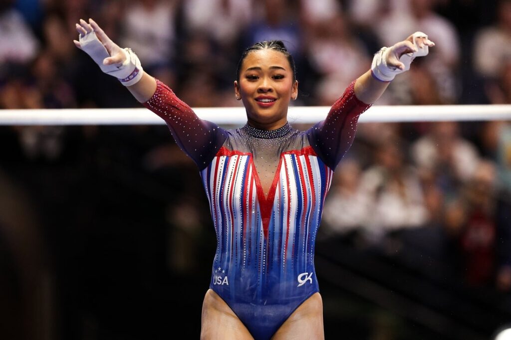 Suni Lee celebrates