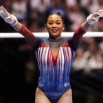 Suni Lee celebrates