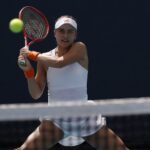 Iva Jovic (USA) hits a backhand