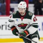 quinn hughes warm