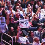 Nov 5, 2022; San Francisco, California, USA;  A fan holds a sign