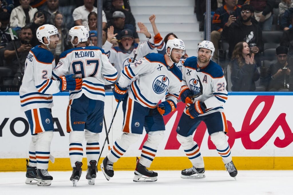 Oilers, Canucks