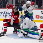 Devils, Canucks